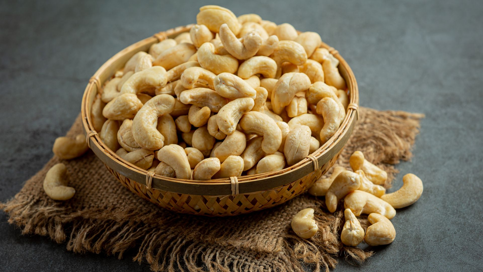 Whole cashew kernels in a woven basket