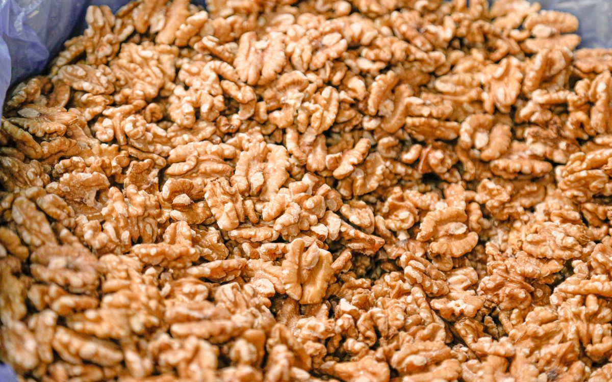 Light walnut kernel halves in a lined carton